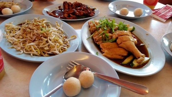 Malaysian-style food displayed on plates
